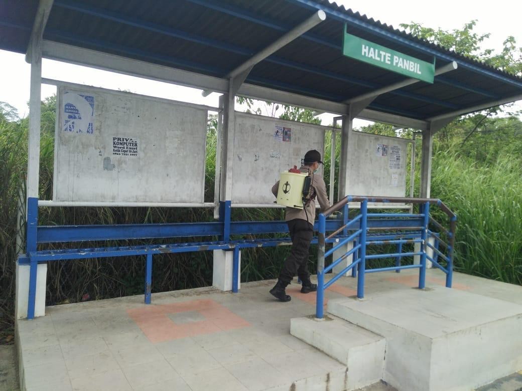 Polsek Sei Beduk Semprotkan Disinfektan Kawasan Industri Hingga Pasar