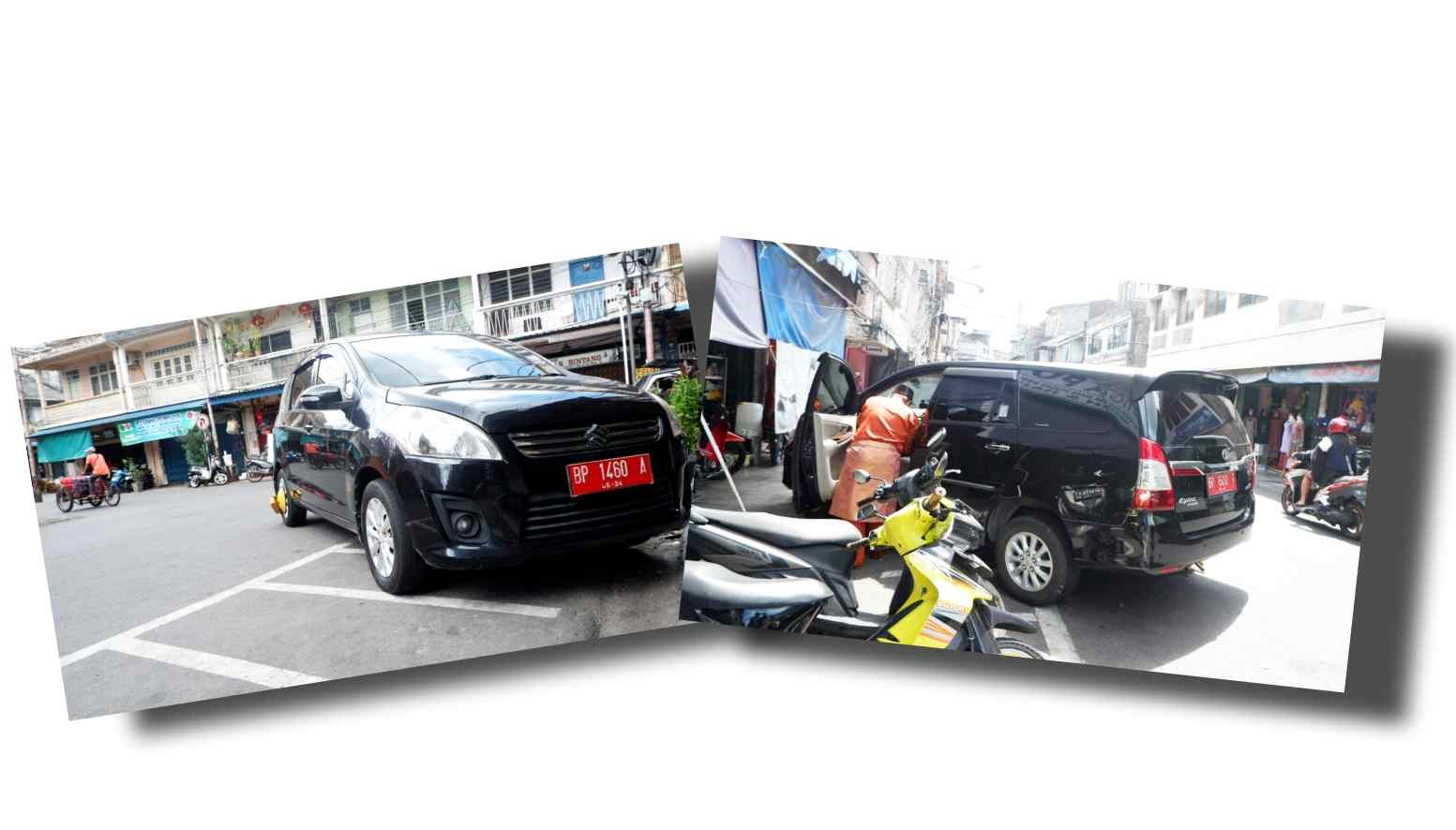 Langgar Aturan Parkir, Mobil Plat Merah Digembok Petugas Dishub
