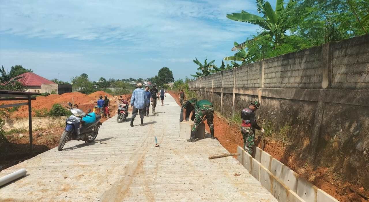 Pengerjaan Fisik Semenisasi Jalan TMMD 116 di Kaveling Seraya Sambau Capai 69 Persen